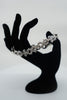 INFINITY SPIKE CROSS BRACELET